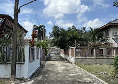 Residential street view with houses and greenery