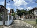 Residential street view with houses and greenery