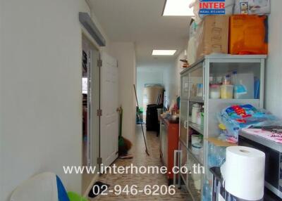 Interior of a utility room with shelving and various supplies