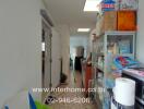 Interior of a utility room with shelving and various supplies