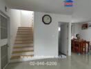 Main living area with a staircase and dining area