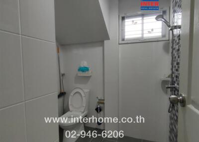 Bathroom with shower and toilet