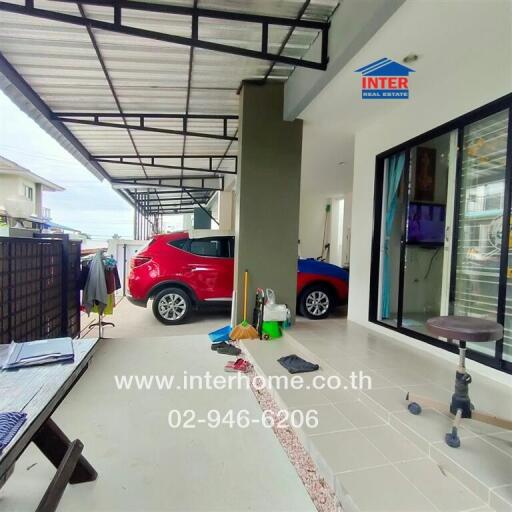 Outdoor view of house with carport