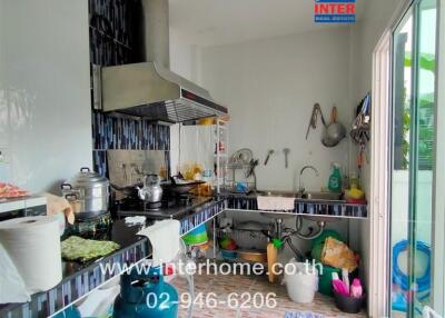 Modern kitchen with cooking area and sink