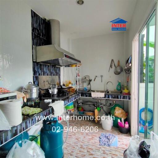 Modern kitchen with cooking area and sink