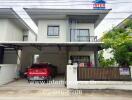 Two-story house with a carport