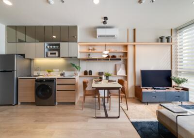 Modern living area with open kitchen and dining space