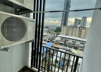 Balcony view with air conditioning units