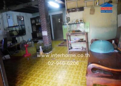 Living room with furniture and various household items