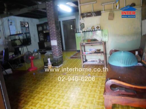 Living room with furniture and various household items