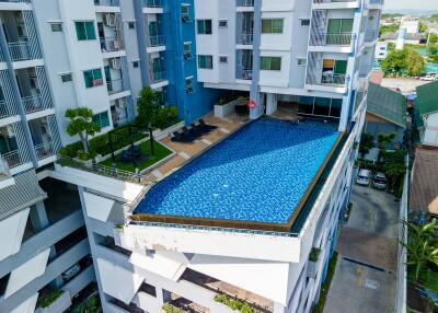 High-rise building with a rooftop pool