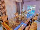 Luxurious dining room with ornate chairs and a glass-top table, featuring pool view