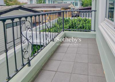 Outdoor balcony space with railing