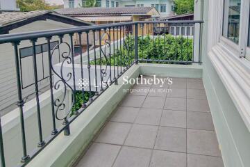 Outdoor balcony space with railing