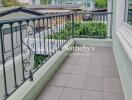 Outdoor balcony space with railing