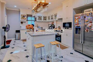 Modern kitchen with island and barstools