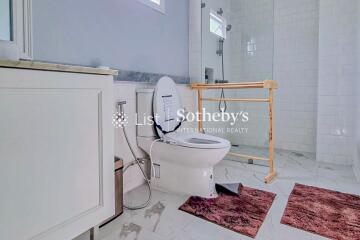 Bright bathroom with modern fixtures and a large shower