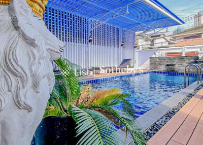 Outdoor swimming pool area with decorative elements