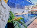 Outdoor swimming pool area with decorative elements