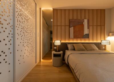 Modern and cozy bedroom with wooden accents and ambient lighting