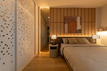 Modern and cozy bedroom with wooden accents and ambient lighting