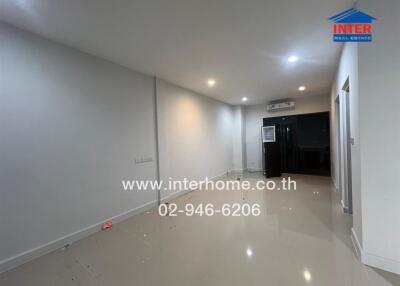 Spacious living area with tiled floor