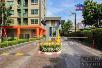 Entrance of a residential complex with security booth