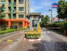 Entrance of a residential complex with security booth