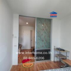 Living room with partition door and desk