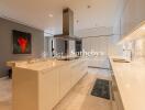 Modern kitchen with marble countertops and island