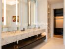 Modern bathroom with dual sinks and large mirrors