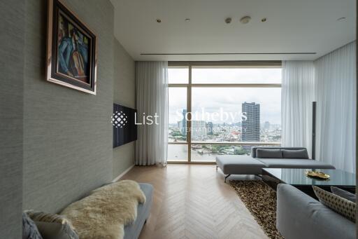 Modern living room with large window and city view