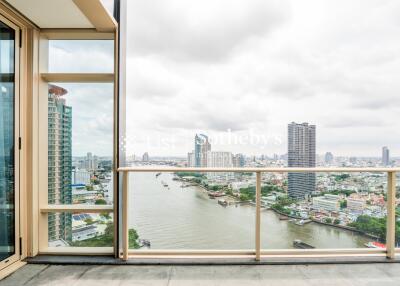 Balcony with river and city skyline view