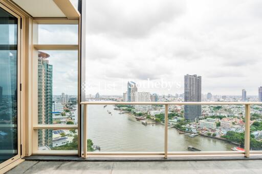 Balcony with river and city skyline view