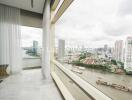 High-rise balcony with city and river view