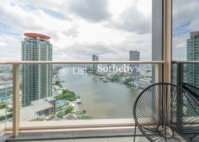 Balcony with a view of the river and city skyline