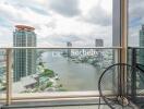 Balcony with a view of the river and city skyline