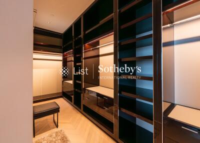 Spacious walk-in closet with ample storage space