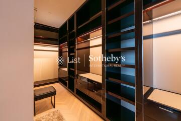 Spacious walk-in closet with ample storage space