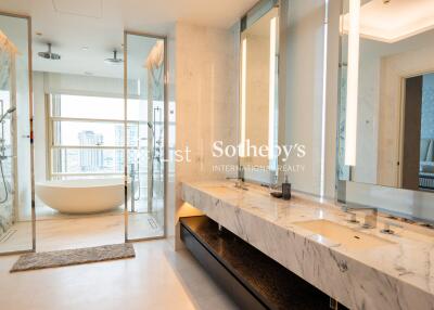 Luxurious modern bathroom with panoramic view, double vanity, separate shower and freestanding bathtub