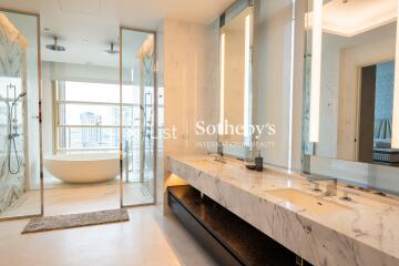 Luxurious modern bathroom with panoramic view, double vanity, separate shower and freestanding bathtub