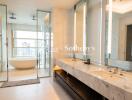 Luxurious modern bathroom with panoramic view, double vanity, separate shower and freestanding bathtub