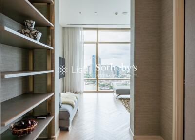 View of living room with large windows and city view