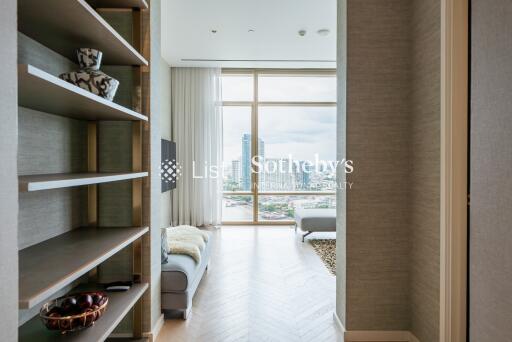 View of living room with large windows and city view