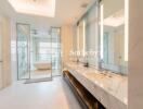 Modern bathroom with double sinks, large mirrors, a bathtub, and a shower