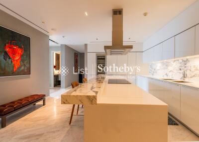 Modern kitchen with marble countertops and contemporary decor