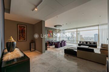 Spacious modern living room with city view