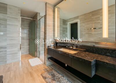 Modern bathroom with elegant fixtures and walk-in shower