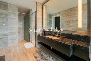 Modern bathroom with elegant fixtures and walk-in shower