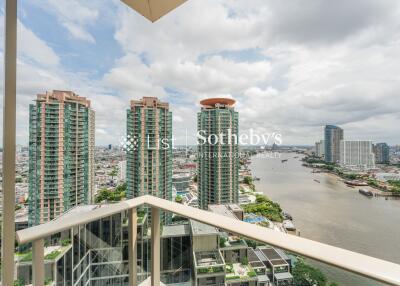 View from balcony overlooking the river and city skyline